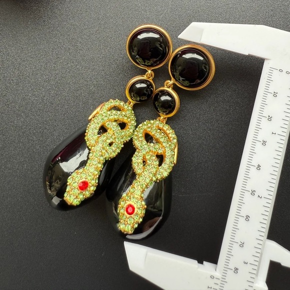 Elegant Black and Gold Snake Earrings - Picture 4 of 4